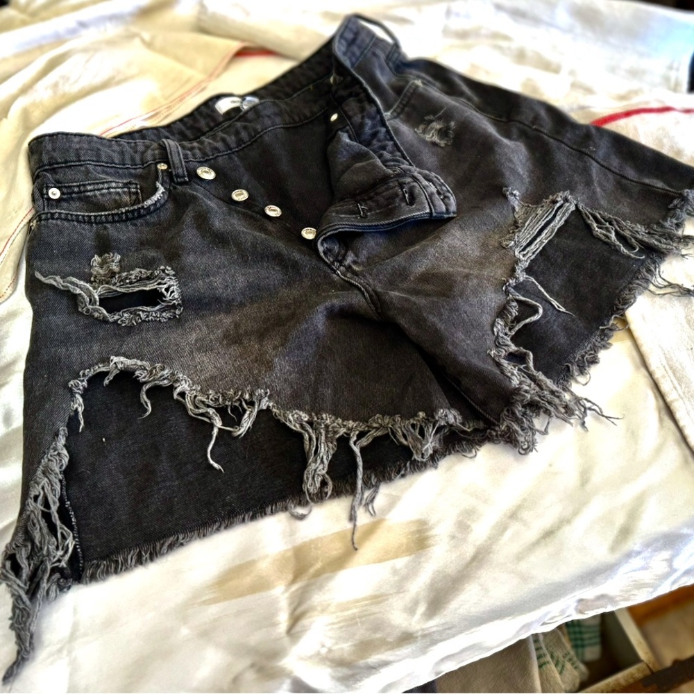 Distressed high-low rise charcoal jeans. Size 30- Unique fold over button detail